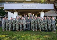 Adm. Steve Koehler, commander, U.S. Pacific Fleet, center, met with Sailors from several Navy Reserve public affairs units that support the command during a public affairs summit at Joint Base Pearl Harbor-Hickam, Hawaii, on Jan. 10.