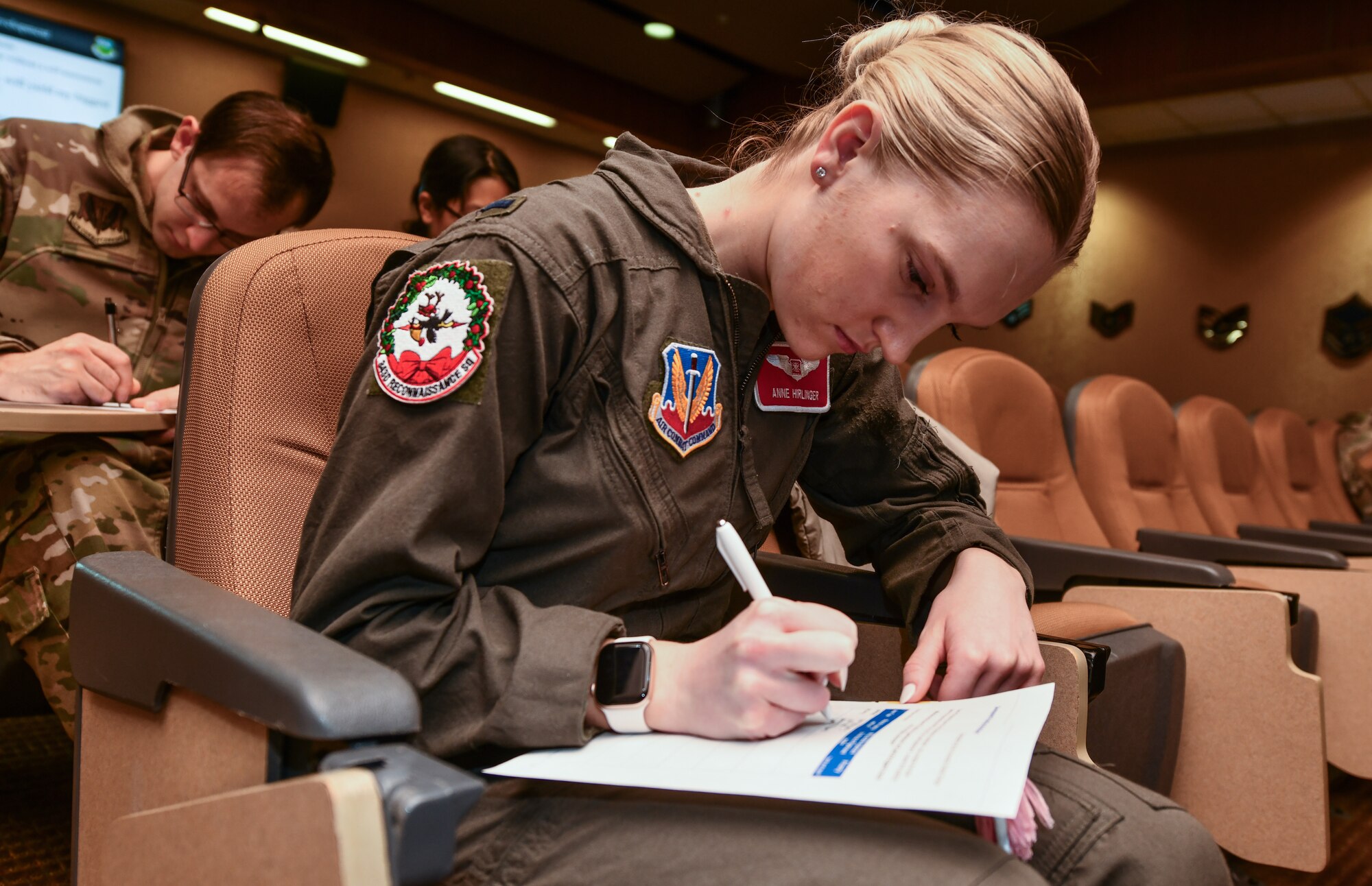 1st Lt. Anne Hirlinger, 343rd Reconnaissance Squadron, fills out a worksheet during the Flight Commanders course at Offutt Air Force Base, Jan. 24, 2025. (U.S. Air Force photo by Chad Watkins)