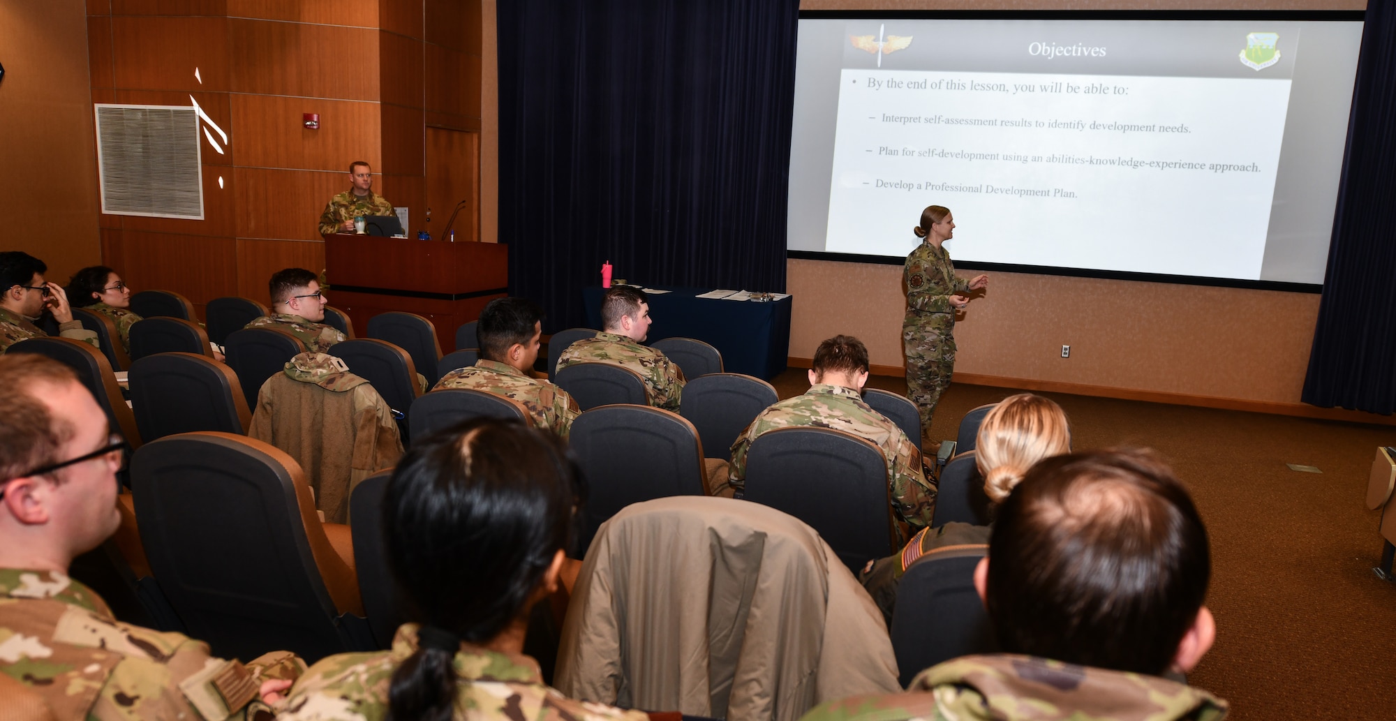 Chief Master Sgt. Tabatha Sanders, 55th Operations Group senior enlisted leader, speaks to a class of company grade officers during the Flight Commanders Course at Offutt Air Force Base, Jan. 24, 2025. The course featured senior non-commissioned officers mentoring young officers to enhance their leadership abilities. (U.S. Air Force photo by Chad Watkins)