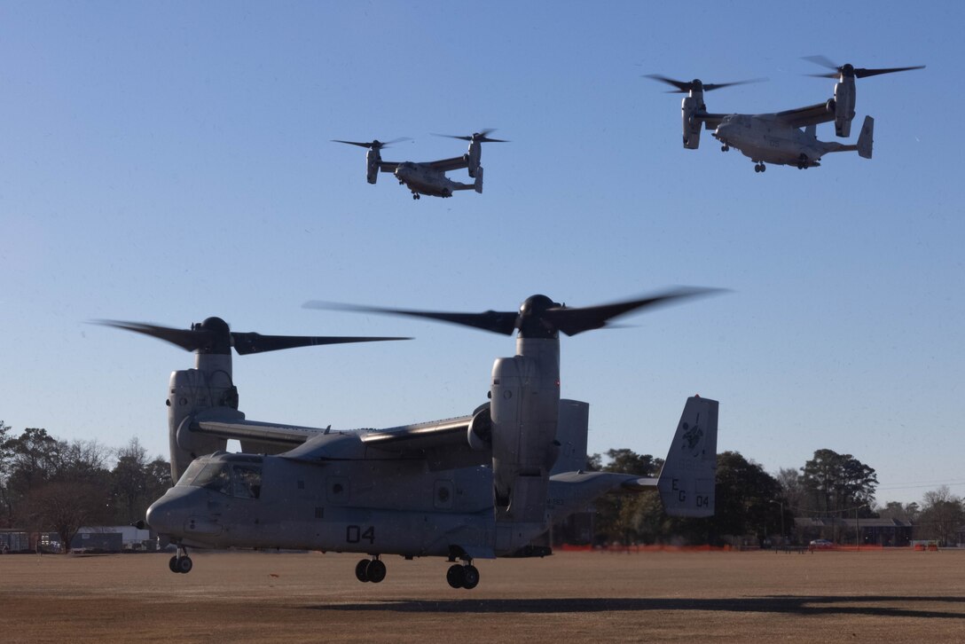 U.S. Marine Corps MV-22B Ospreys assigned to Marine Medium Tiltrotor Squadron 263 (Reinforced), 22nd Marine Expeditionary Unit, land on W.P.T. Hill Field at the conclusion of Marine Expeditionary Unit Exercise at Marine Corps Base Camp Lejeune, North Carolina, Jan. 17, 2025. MEUEX is the 22nd MEU's first large-scale exercise as a composited Marine Air-Ground Task Force, focusing on split operations with consolidated command and control to enhance readiness for its upcoming deployment. (U.S. Marine Corps photo by Lance Cpl. Christian Alston)