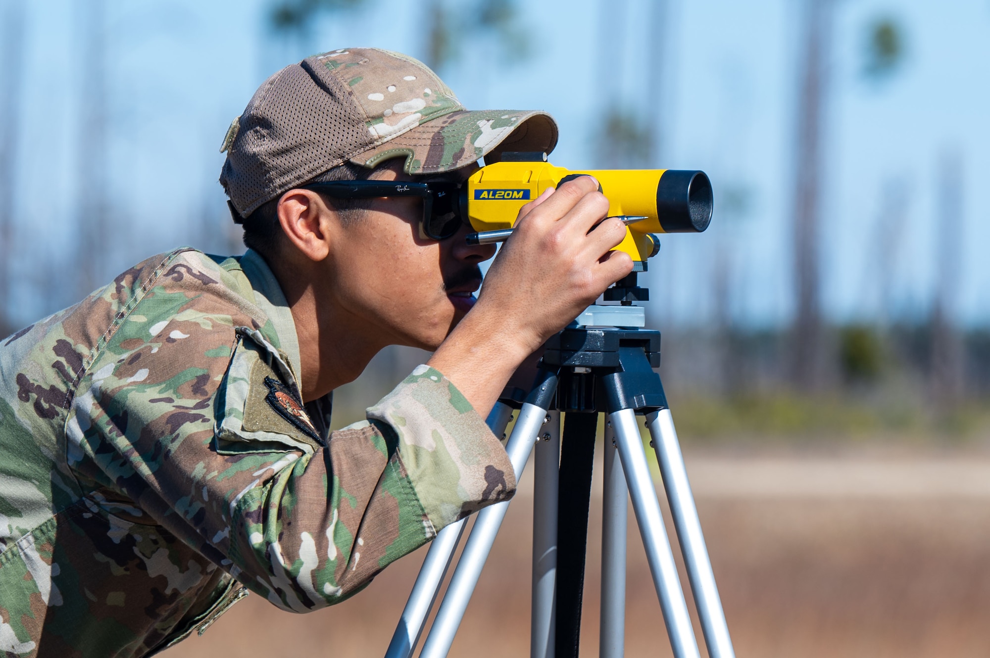 A U.S. Airman assigned to the 11th Air Task Force checks the alignment of an airfield lighting system at Tyndall Air Force Base, Florida, Jan. 26, 2025. Airfield lighting systems provide pilots with accurate visual cues regarding the runway alignment and their position relative to the centerline. (U.S. Air Force photo by Senior Airman Jasmyne Bridgers-Matos)