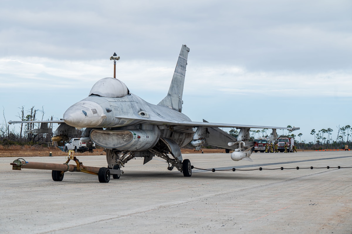 A U.S. Air Force F-16 Fighting Falcon aircraft is stopped by an aircraft arresting system at Tyndall Air Force Base, Florida, Jan. 27, 2025. Airmen demonstrated the ability to safely land an aircraft following a simulated severe weather event. (U.S. Air Force photo by Senior Airman Jasmyne Bridgers-Matos)