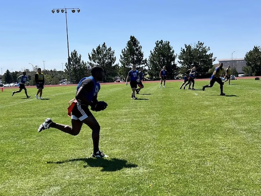  Members of the 8th Training Squadron participate in a flag football game on Schriever Space Force Base, Colo., in May 2024. The 8 TS, part of Space Delta 8, cinched the 2024 Schriever Commander’s Cup for excellence and participation in intramural sports and fitness activities for the year. (Courtesy photo)