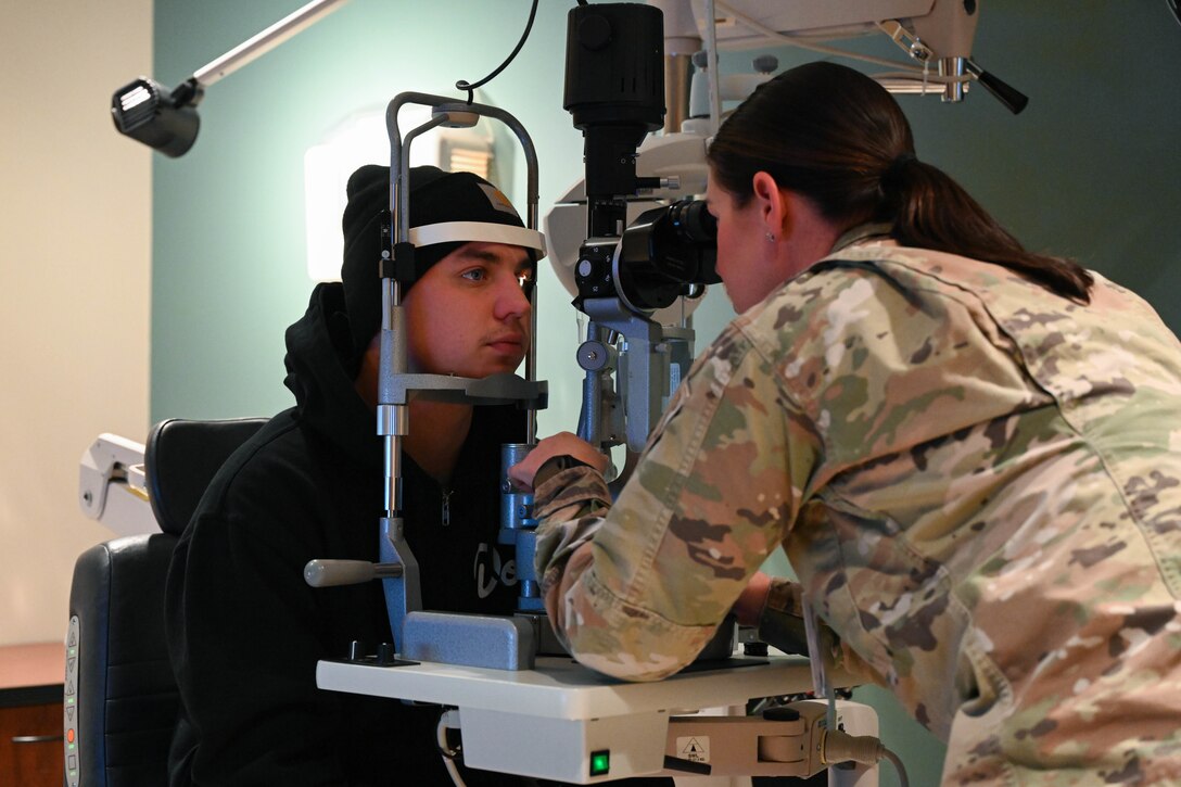 28th Medical Group Optometrists perform eye care examinations.
