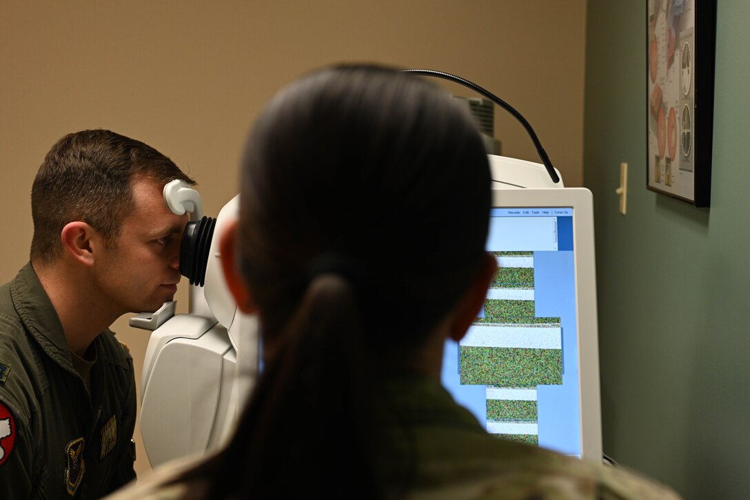 28th Medical Group Optometrists perform eye care examinations.