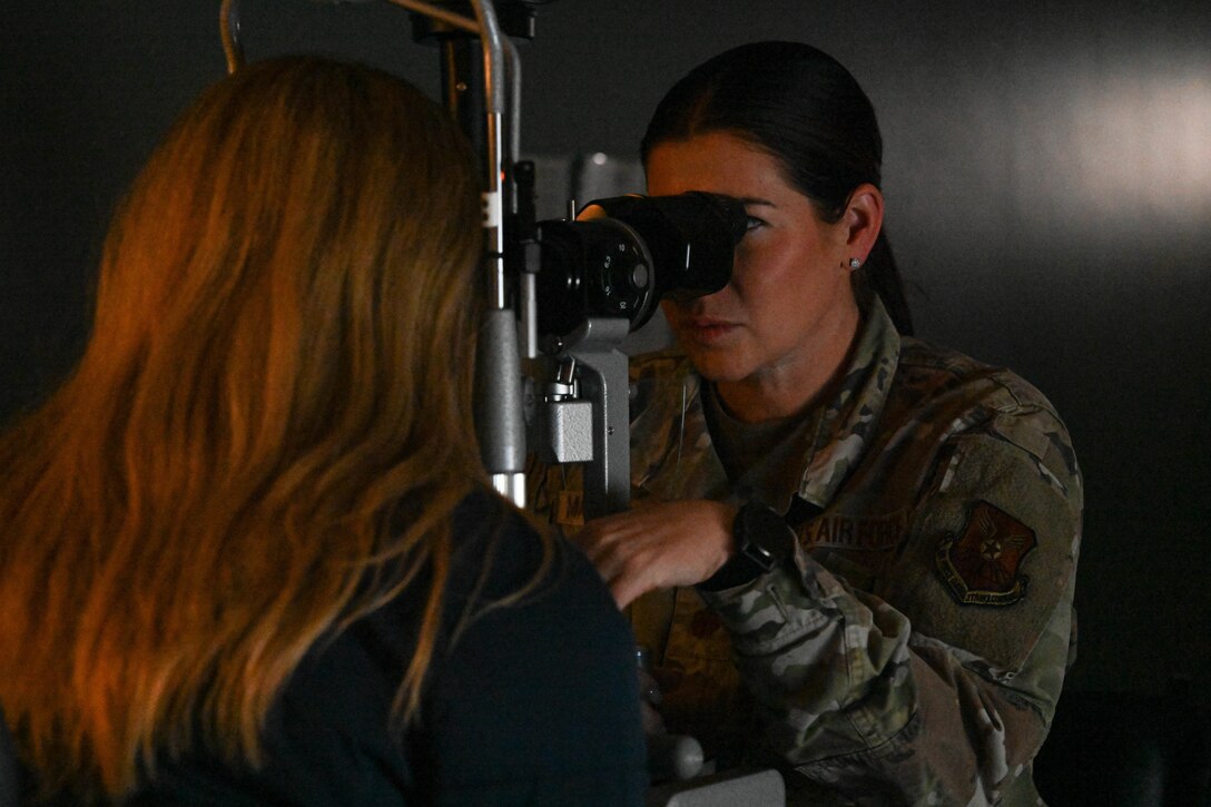 28th Medical Group Optometrists perform eye care examinations.