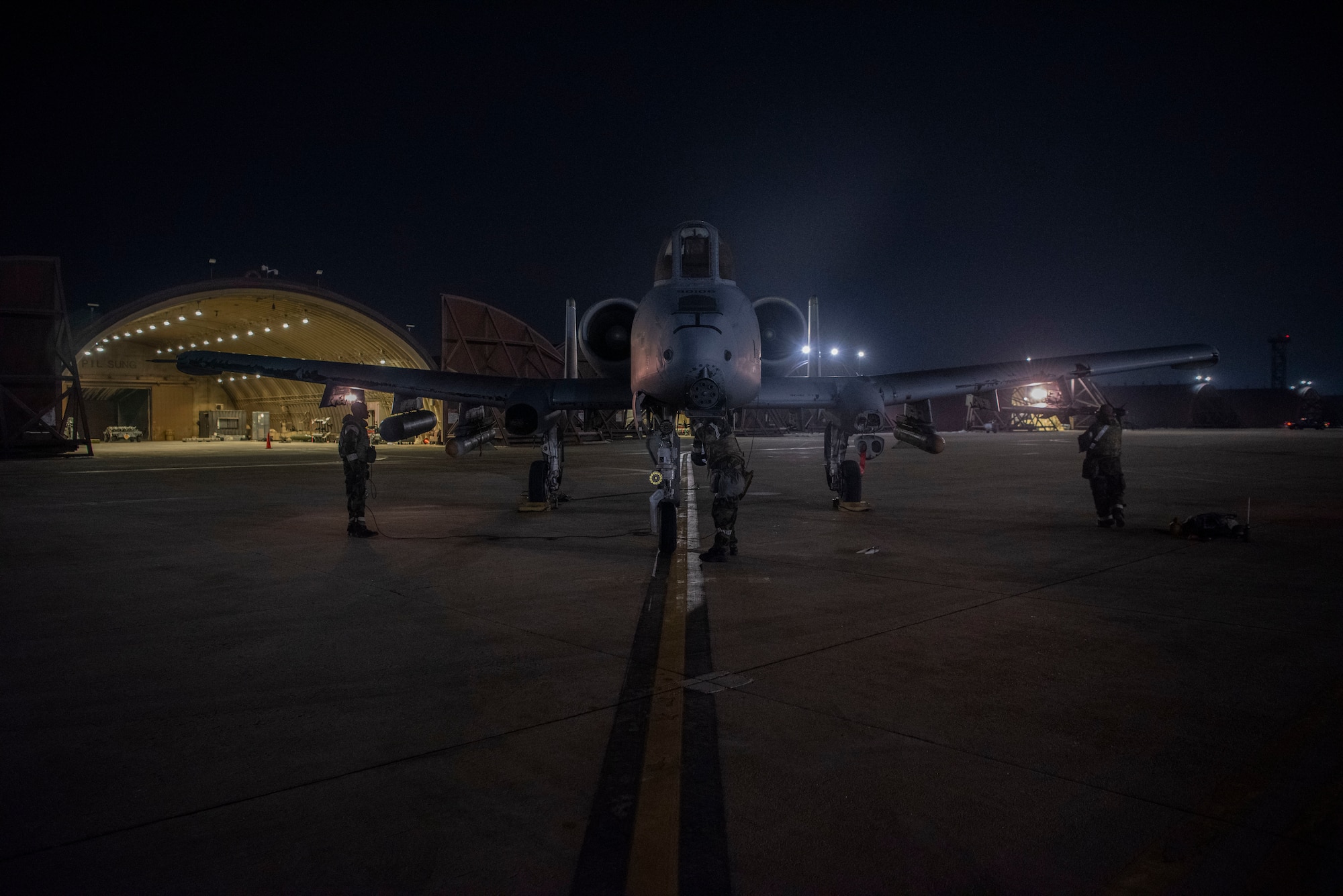 Airmen assigned to the 51st Fighter Wing prepare an A-10 Thunderbolt II for flight during exercise Beverly Herd 25-2 at Osan Air Base, Republic of Korea, Jan. 30, 2025. The 51st FW regularly conducts Beverly Herd exercises to ensure the ability to survive and operate in a contested environment. The wing also exercised generating airpower with potential CBRN contamination. (U.S. Air Force photo by Staff Sgt. Jason W. Cochran)