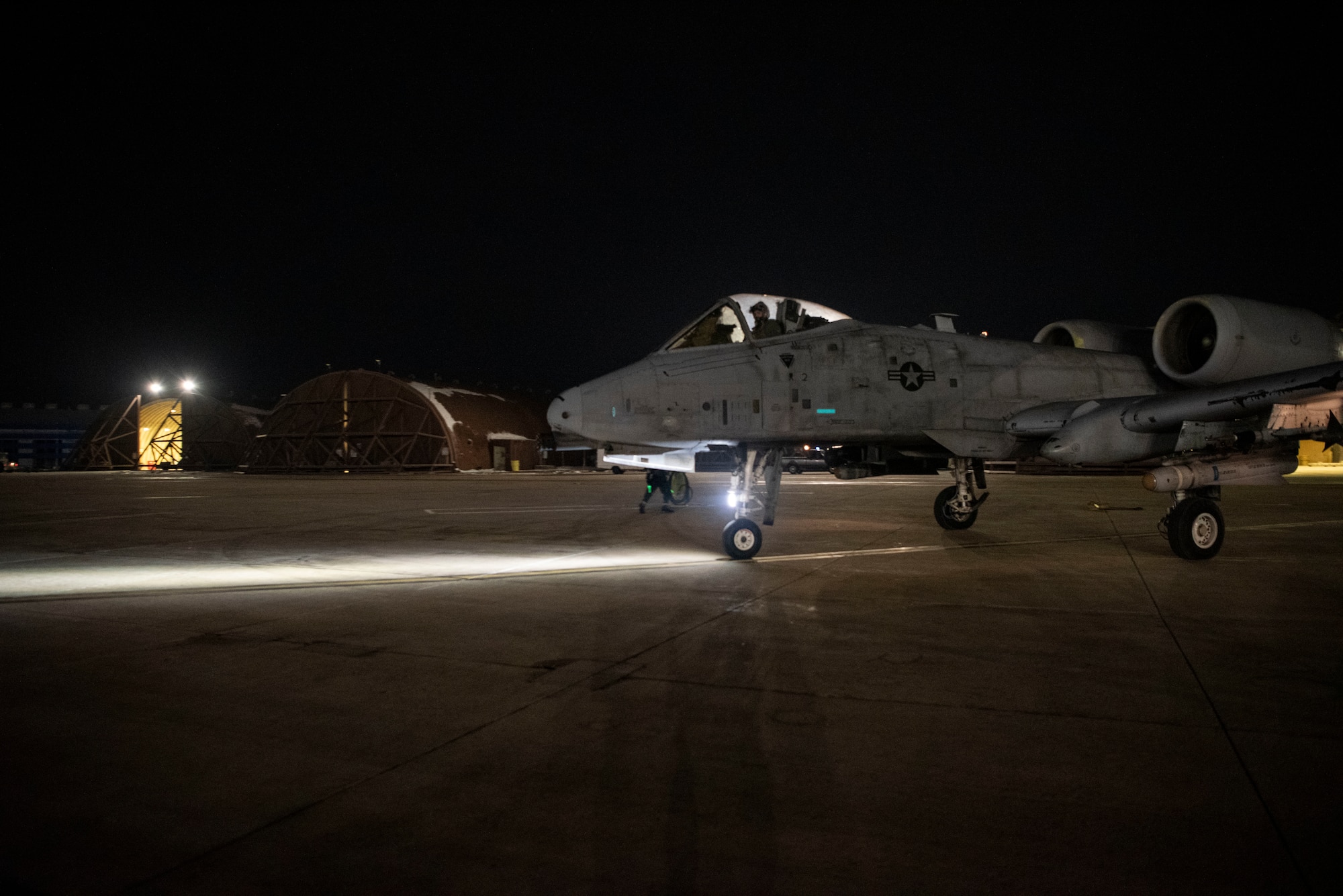 U.S. Air Force Capt. Chris Hidalgo, 25th Fighter Squadron A-10 Thunderbolt II pilot, taxis toward the runway during Beverly Herd 25-2 at Osan Air Base, Republic of Korea, Jan. 30, 2025. Hidalgo exercised a rapid crew swap with simulated CBRN contamination as part of the exercise. (U.S. Air Force photo by Staff Sgt. Jason W. Cochran)
