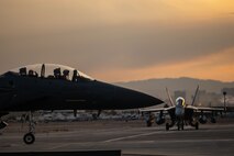 A U.S. Air Force F-15E Strike Eagle assigned to 366th Fighter Wing, Mountain Home Air Force Base (AFB), Idaho, taxis in after a mission during Red Flag-Nellis 25-1, Jan. 27, 2025, at Nellis AFB, Nevada.