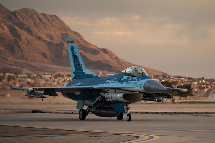 A U.S. Air Force F-16 Fighting Falcon assigned to 64th Aggressor Squadron, Nellis Air Force Base (AFB), Nevada, taxis in after a mission during Red Flag-Nellis 25-1, Jan. 27, 2025.