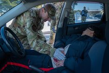 U.S. Air Force Senior Airman Devon Pena, 35th Security Force Squadron installation entry controller, grabs a simulated suspect's hands during an active shooter exercise at Misawa Air Base, Japan, Jan. 24, 2025. The 35th Fighter Wing prioritizes readiness, and exercises like these help Airmen sharpen their skills and prepare for any situation.