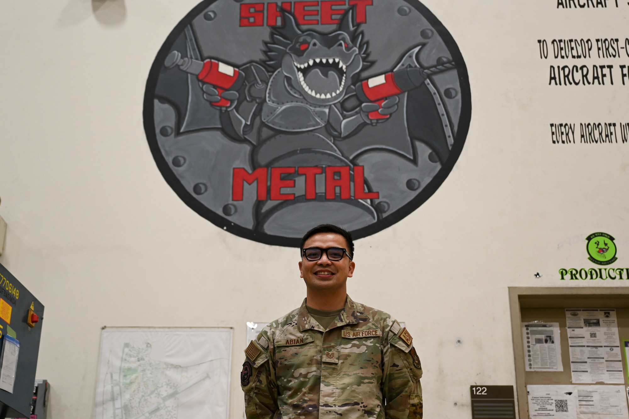 U.S. Air Force Tech. Sgt. Timothy Abian, 8th Maintenance Squadron aircraft structural maintenance section chief, poses for a photo in the fabrication flight building at Kunsan Air Base, Republic of Korea.