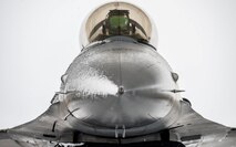 A U.S. Air Force Airmen assigned to the 36th Fighter Generation Squadron avionics section performs an inspection in the cockpit of an F-16 Fighting Falcon during exercise Beverly Herd 25-2 at Kunsan Air Base, Republic of Korea, Jan. 28, 2025.