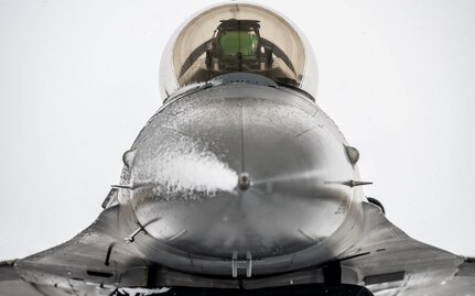 A U.S. Air Force Airmen assigned to the 36th Fighter Generation Squadron avionics section performs an inspection in the cockpit of an F-16 Fighting Falcon during exercise Beverly Herd 25-2 at Kunsan Air Base, Republic of Korea, Jan. 28, 2025.