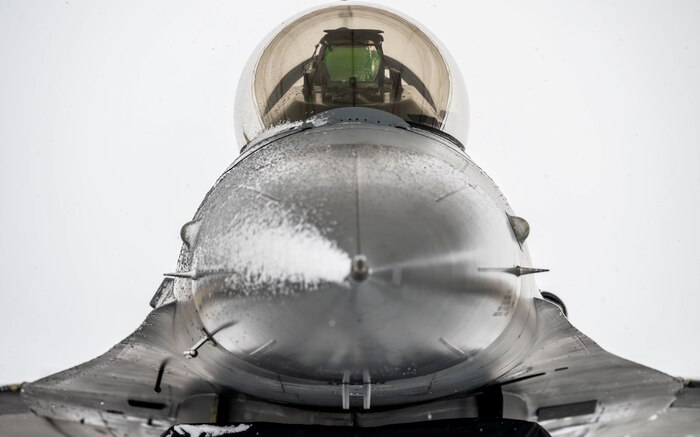 A U.S. Air Force Airmen assigned to the 36th Fighter Generation Squadron avionics section performs an inspection in the cockpit of an F-16 Fighting Falcon during exercise Beverly Herd 25-2 at Kunsan Air Base, Republic of Korea, Jan. 28, 2025.