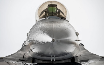 A U.S. Air Force Airmen assigned to the 36th Fighter Generation Squadron avionics section performs an inspection in the cockpit of an F-16 Fighting Falcon during exercise Beverly Herd 25-2 at Kunsan Air Base, Republic of Korea, Jan. 28, 2025.