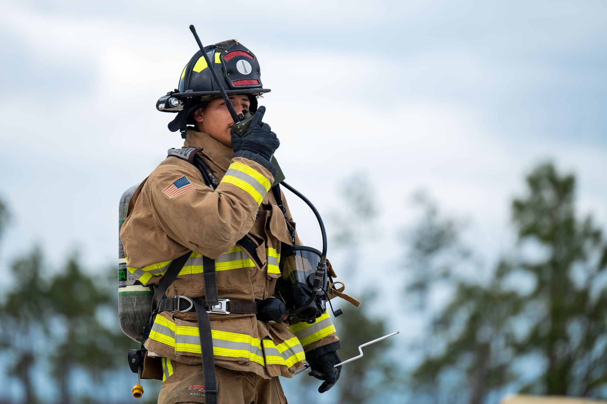 A U.S. Airman assigned to the 11th Air Task Force communicates with his team at Tyndall Air Force Base, Florida, Jan. 27, 2025. The Airman informed other personnel that an inbound aircraft safely landed and was disconnected from the aircraft arresting system. (U.S. Air Force photo by Senior Airman Jasmyne Bridgers-Matos)