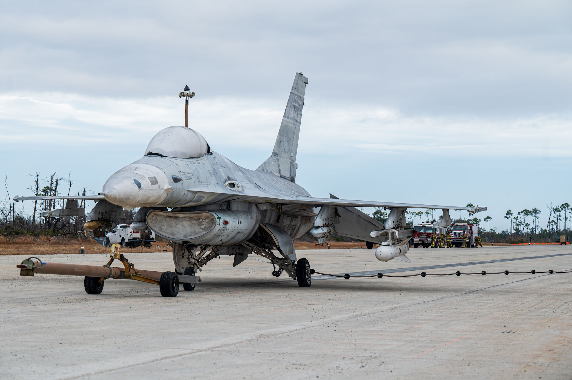 A U.S. Air Force F-16 Fighting Falcon aircraft is stopped by an aircraft arresting system at Tyndall Air Force Base, Florida, Jan. 27, 2025. Airmen demonstrated the ability to safely land an aircraft following a simulated severe weather event. (U.S. Air Force photo by Senior Airman Jasmyne Bridgers-Matos)