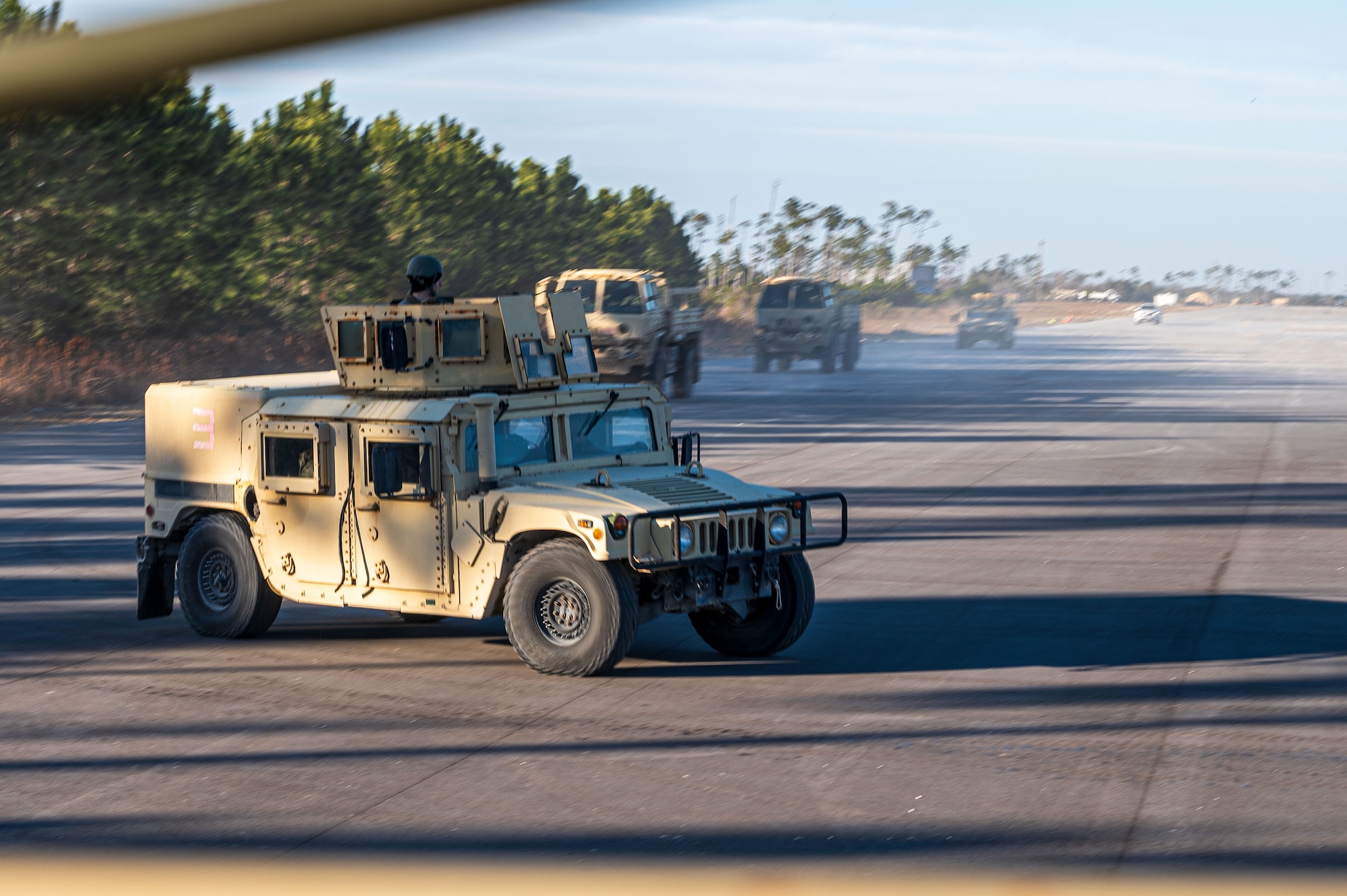 U.S. Airmen assigned to the 11th Air Task Force participate in convoy training at Tyndall Air Force Base, Florida, Jan. 23, 2025. Airmen traveled in convoys to ensure the safe transportation of personnel and critical equipment. (U.S. Air Force photo by Senior Airman Jasmyne Bridgers-Matos)