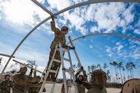 U.S. Airmen assigned to the 11th Air Task Force construct a tent at Tyndall Air Force Base, Florida, Jan. 21, 2025. The 11th ATF empowers Airmen to execute the mission while optimizing agile combat employment to advance the capabilities of air power and overcome the challenges of tomorrow. (U.S. Air Force photo by Senior Airman Jasmyne Bridgers-Matos)