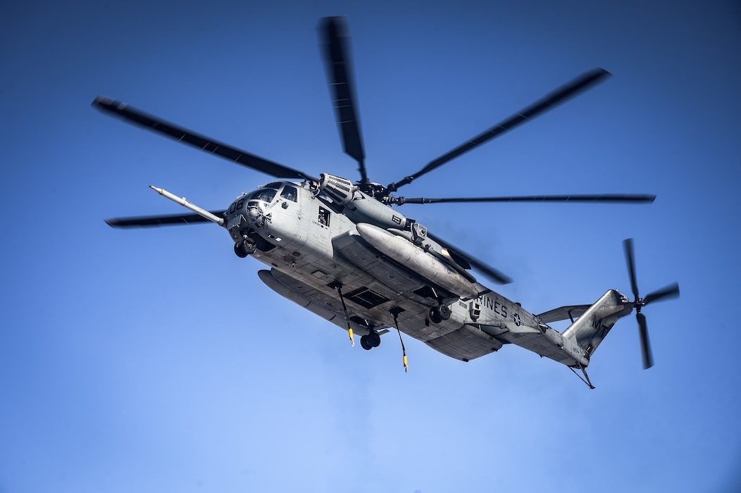 A CH-53E Super Stallion helicopter assigned to Marine Heavy Helicopter Squadron 772 prepares to land at Fort Indiantown Gap, P.A., Jan. 22, 2025. The helicopter was requested on behalf of the Pennsylvania Army National Guard to lift and relocate nine Stryker armored vehicles to the Fort Indiantown Gap training range. The lift was assisted by a team of U.S. Air Force Airmen assigned to the 621st Contingency Response Group who secured and released each Stryker to the helicopter. (U.S. Air Force photo by Senior Airman Matt Porter)