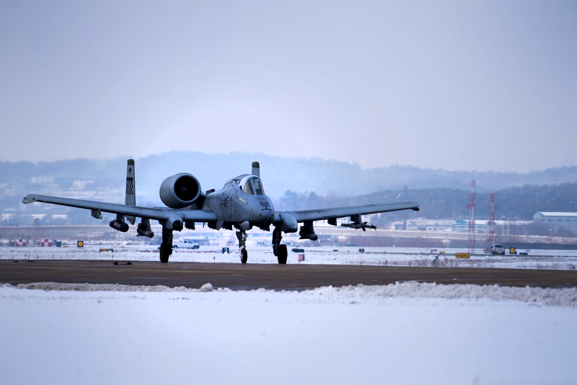 A U.S. Air Force A-10 Thunderbolt II assigned to the 25th Fighter Squadron taxis on the flight line during Beverly Herd 25-2, at Osan Air Base, Republic of Korea, Jan 29, 2025. Despite heavy snowfall, the 51st Fighter Wing continued to generate combat airpower generate combat airpower in support of BH 25-2 exercise scenarios. (U.S. Air Force photo by Senior Airman Sabrina Fuller-Judd)