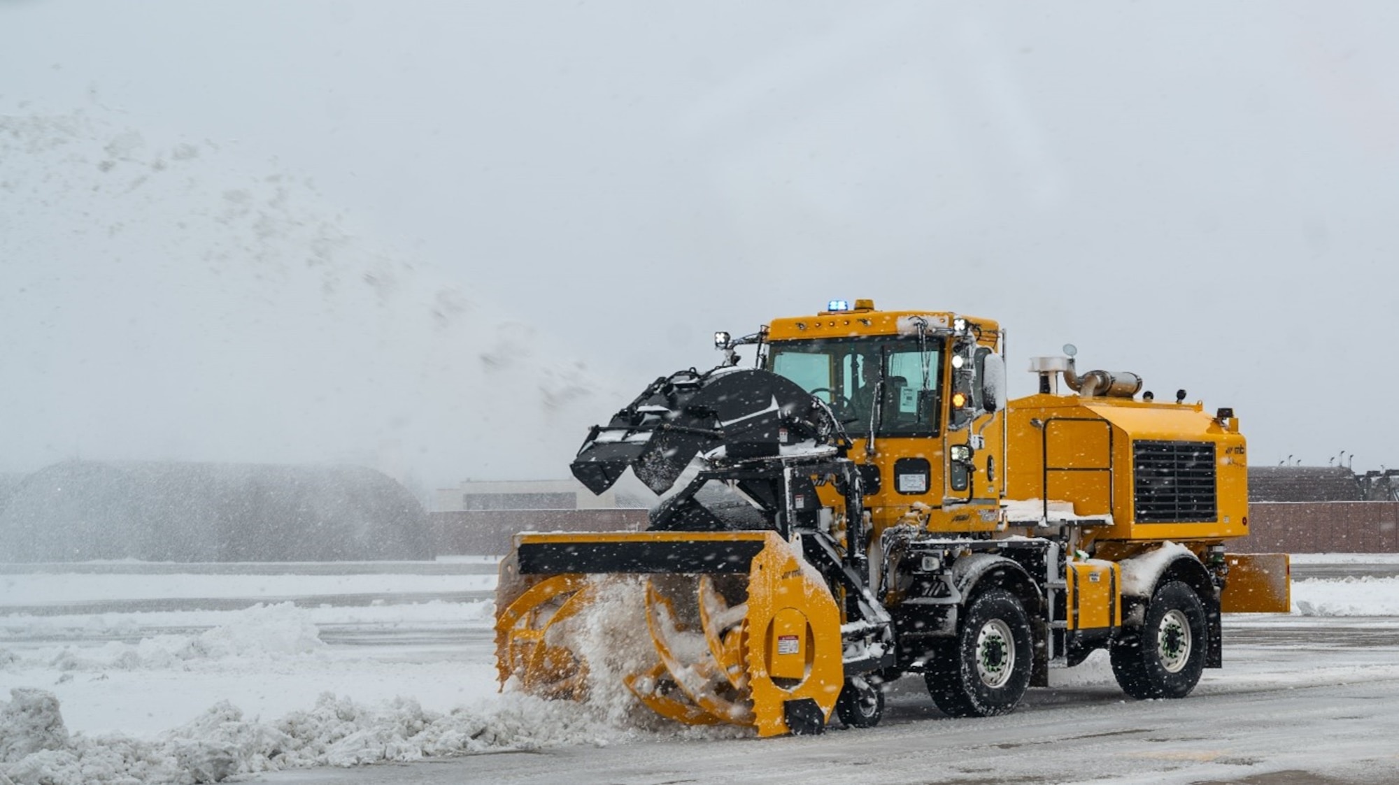 A U.S. Air Force Airman assigned to the 51st Civil Engineering Squadron operates a snow blower during Beverly Herd 25-2, at Osan Air Base, Republic of Korea, Jan. 28, 2025. The 51st CES worked consistently to clear off major taxi ways for aircraft and cargo, maintaining the ‘Fight Tonight’ mission regardless of inclement weather. (U.S. Air Force photo by Senior Airman Sabrina Fuller-Judd)