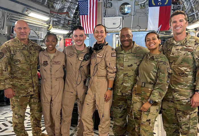 Members of the 36th Aeromedication Evacuation Squadron deployed to Ali Al Salem Air Base, Kuwait pose together during their deployment.
