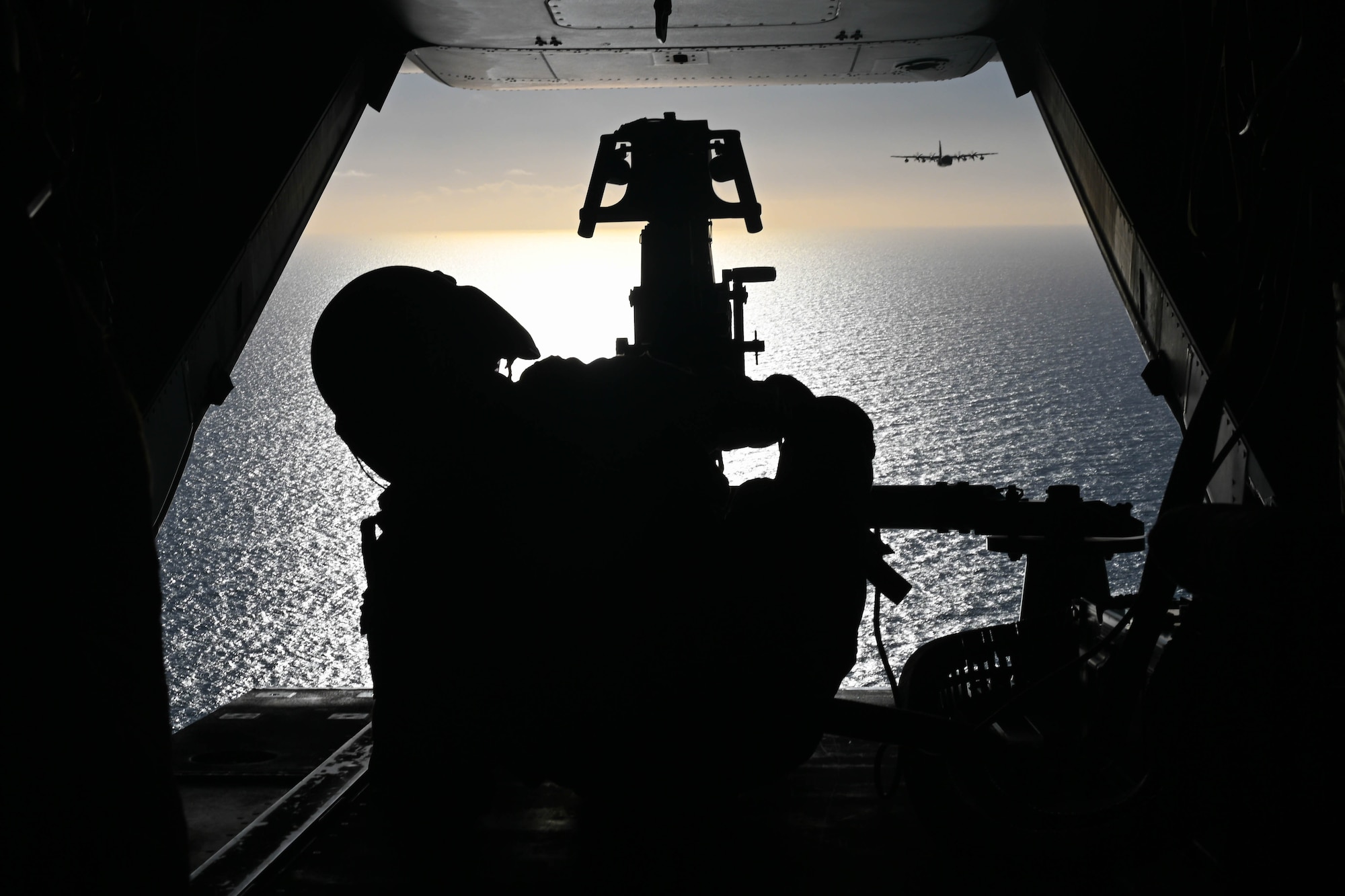 Aircrew sits at the back on a CV-22