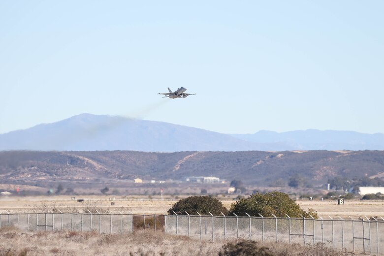 An F/A-18 Hornet assigned to Marine Fighter Attack Squadron (VMFA) 323, Marine Aircraft Group 11, 3rd Marine Aircraft Wing, takes off from Marine Corps Air Station Miramar, California, during a Large Force Exercise conducted by MAG-11 and MAG-13 on Jan. 15, 2025