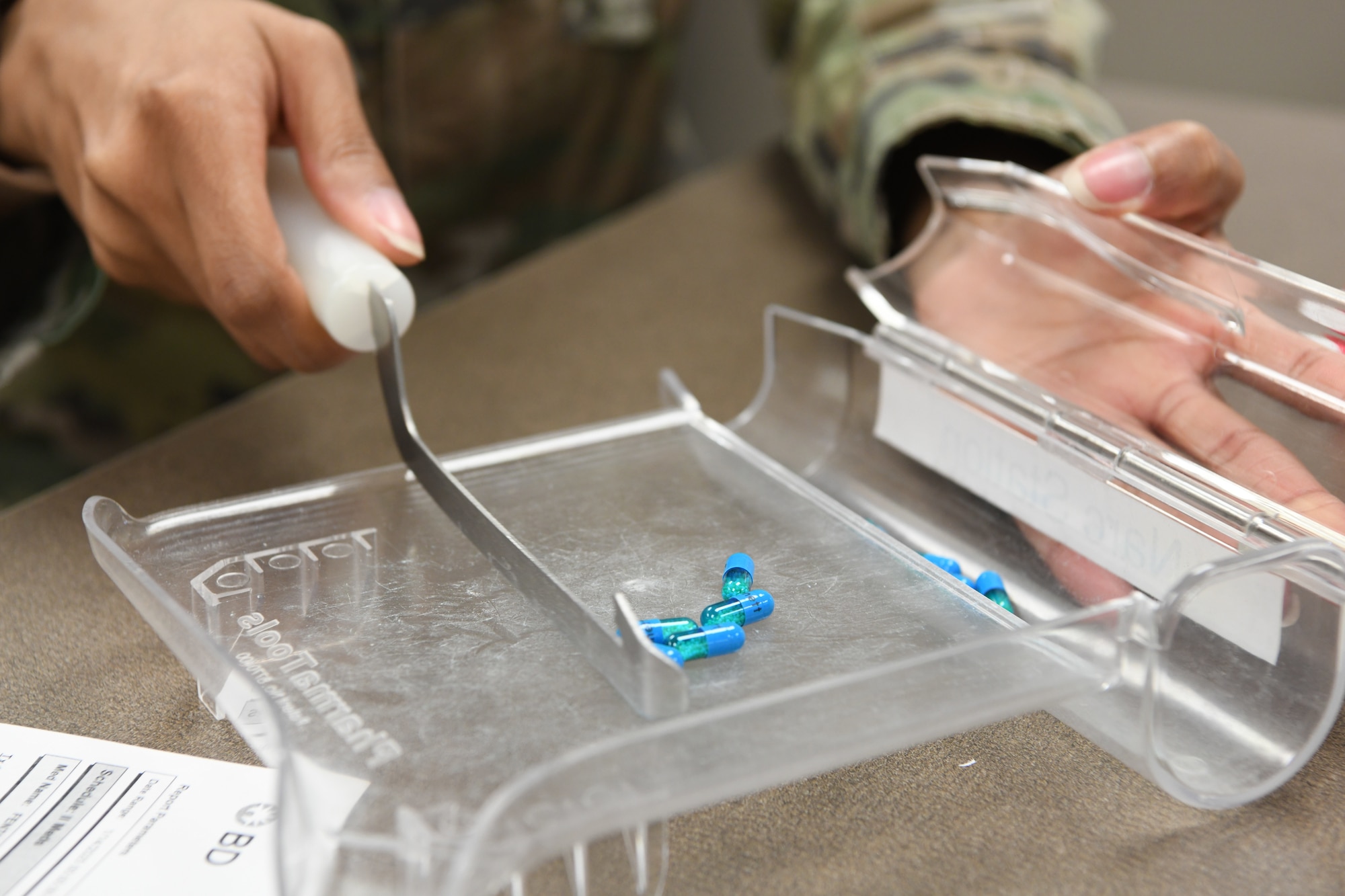 Air Force Capt. Modesta Ugochukwu, 27th Special Operations Healthcare Operations Squadron chief of pharmacy operations, performs an audit of a controlled substance at Cannon Air Force Base, New Mexico, Jan. 14, 2025. The pharmacy team is committed to continuing to enhance services for not only service members but their families as well (U.S. Air Force photo by Senior Airman Drew Cyburt)