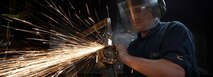 Hull Maintenance Technician Fireman Caden Lucek, from Cottage Grove, Oregon, grinds scrap metal aboard the aircraft carrier USS Nimitz (CVN 68) in the Pacific Ocean, Jan. 27, 2025.