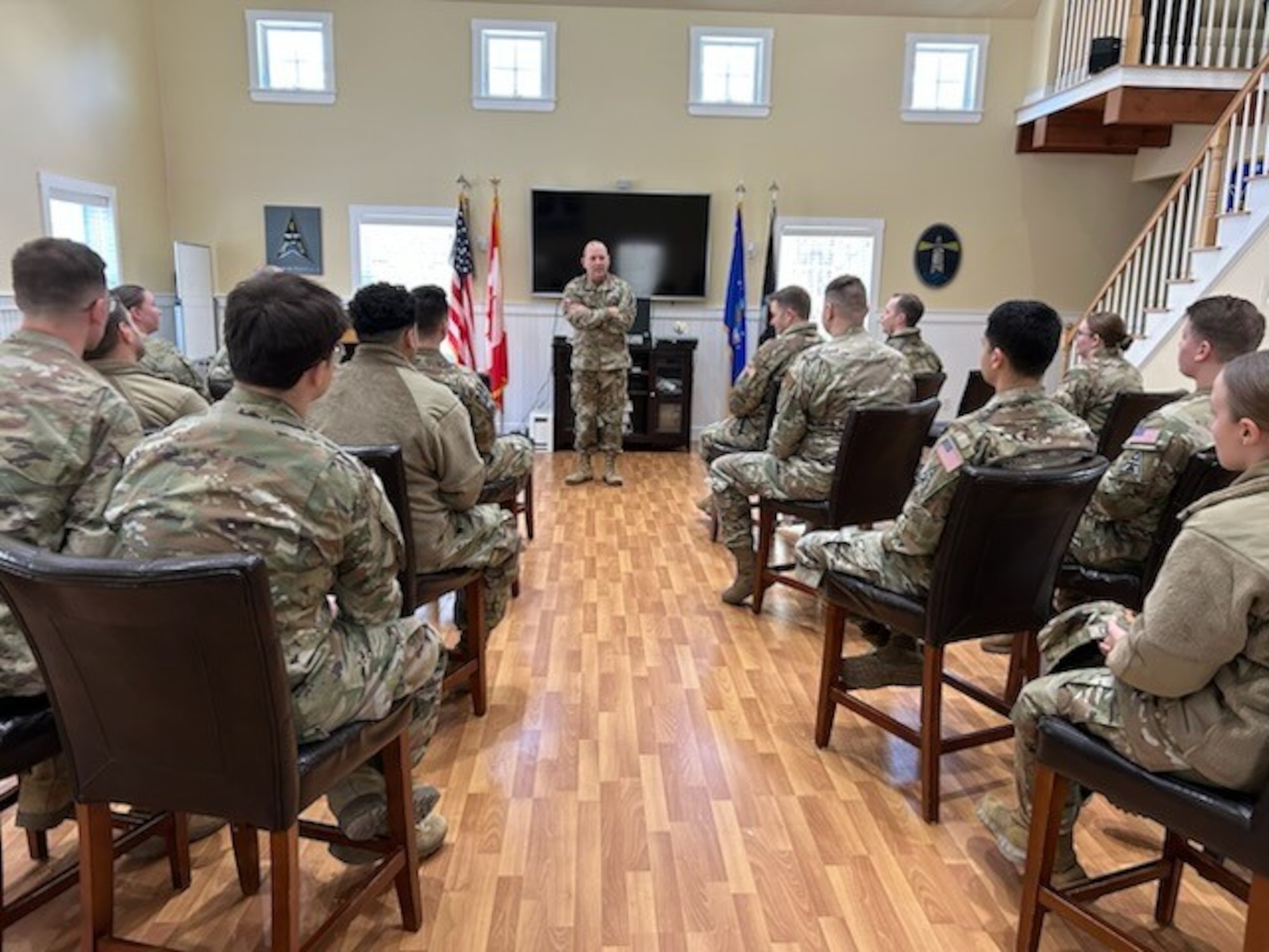 A Space Force general meets with military members in a classroom
