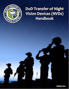 Image of soldiers in silhouette standing outstand in twilight wearing night vision devices.