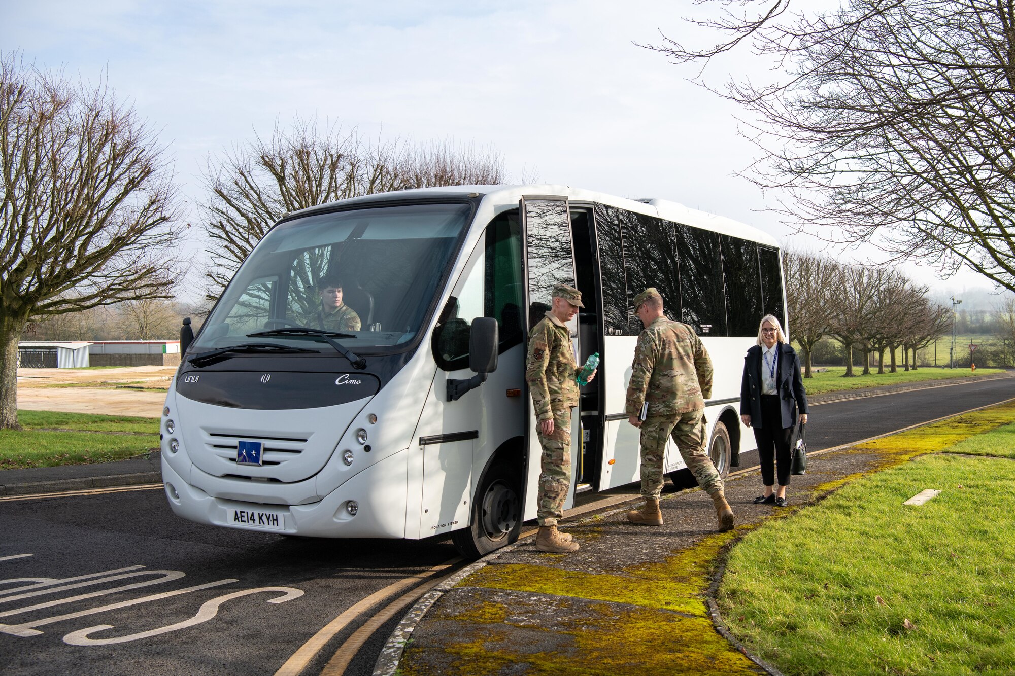 Airmen board a bus