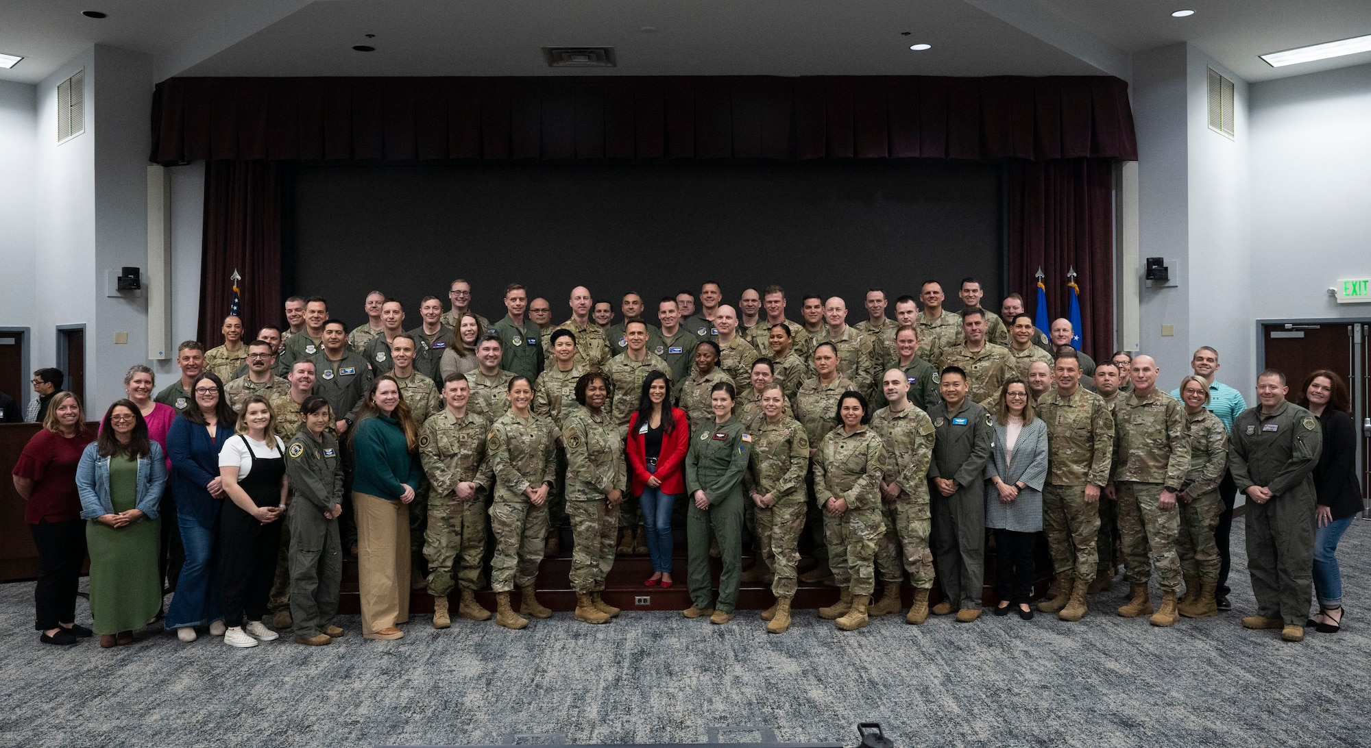 U.S. Air Force Gen. Johnny Lamontagne, Air Mobility Command commander, takes a photo with squadron leaders and their spouses during the AMC Squadron Leadership Course, Jan. 31, 2025, at Scott Air Force Base, Ill. After graduating from the course, attendees leave the class with a certification showcasing that they have acquired the experience and resources to lead in a squadron command leadership or spouse role. (U.S. Air Force photo by Staff Sgt. Dalton Williams)