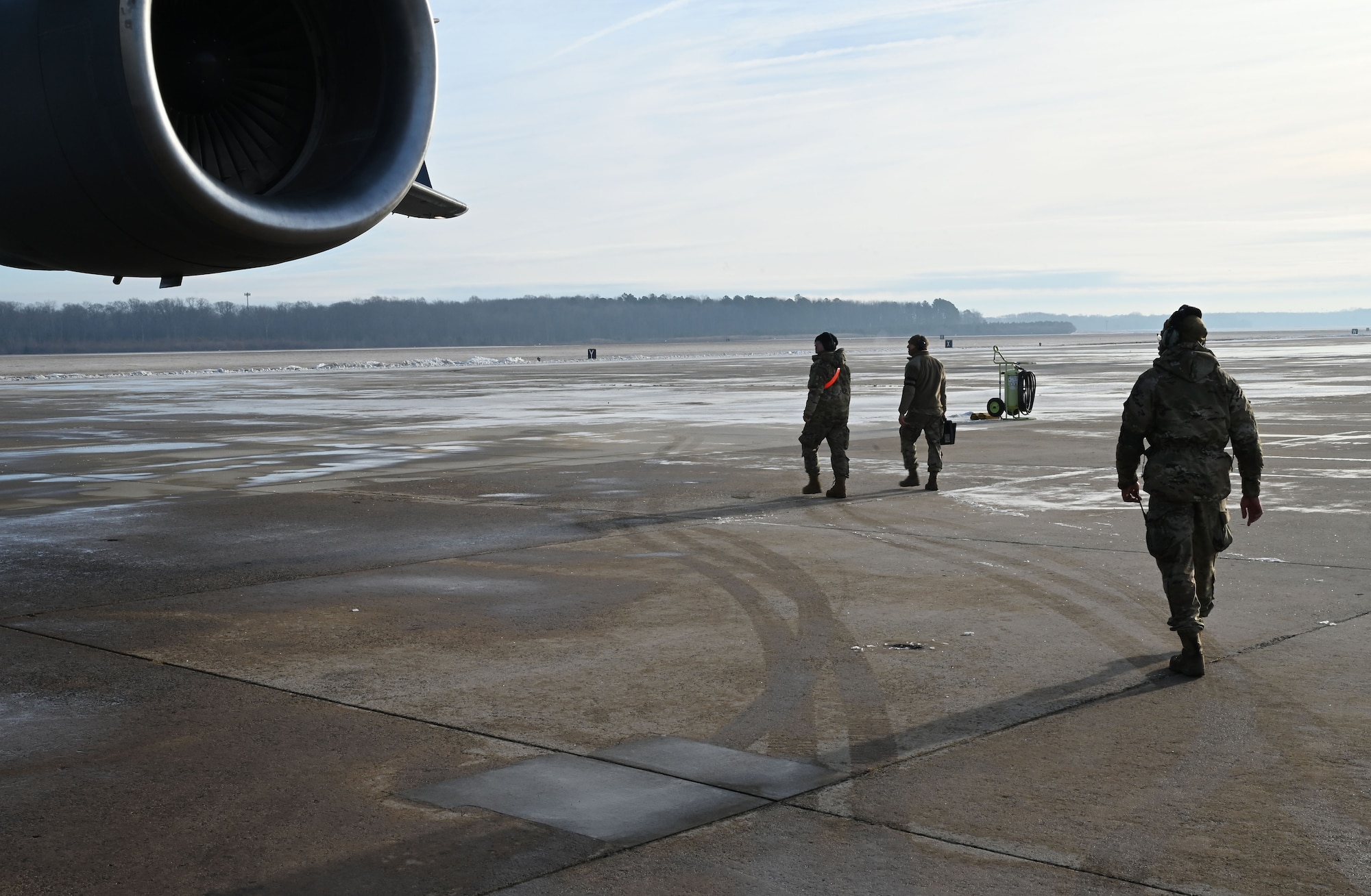 Maintainers inspect aircraft