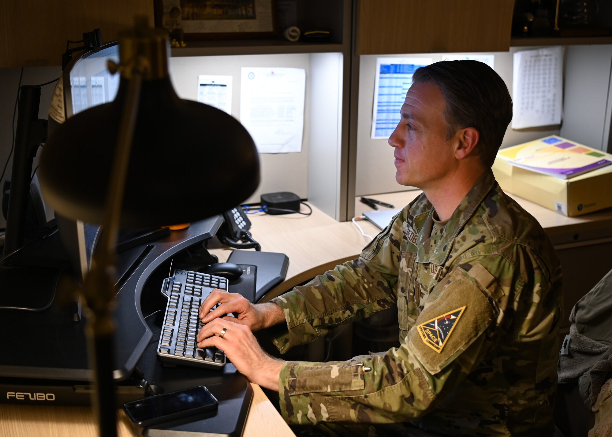 A 30th Operational Medical Readiness Squadron neuropsychologist, prepares for an upcoming appointment with a patient during Biomedical Sciences Corps Week at Vandenberg Space Force Base.