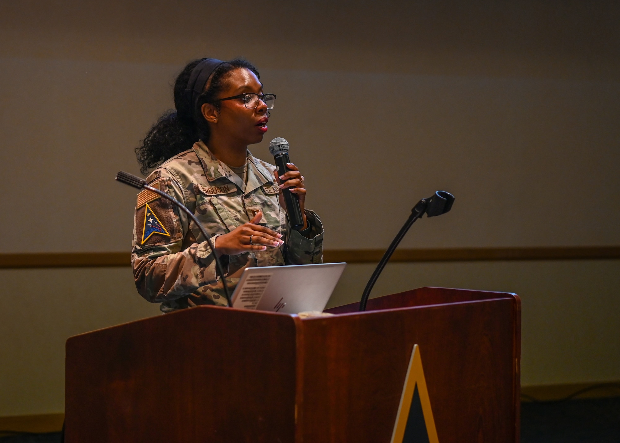 A Vandenberg Space Force Base deputy sexual assault response coordinator, briefs base members on raising awareness about human trafficking during a luncheon at Vandenberg Space Force Base.