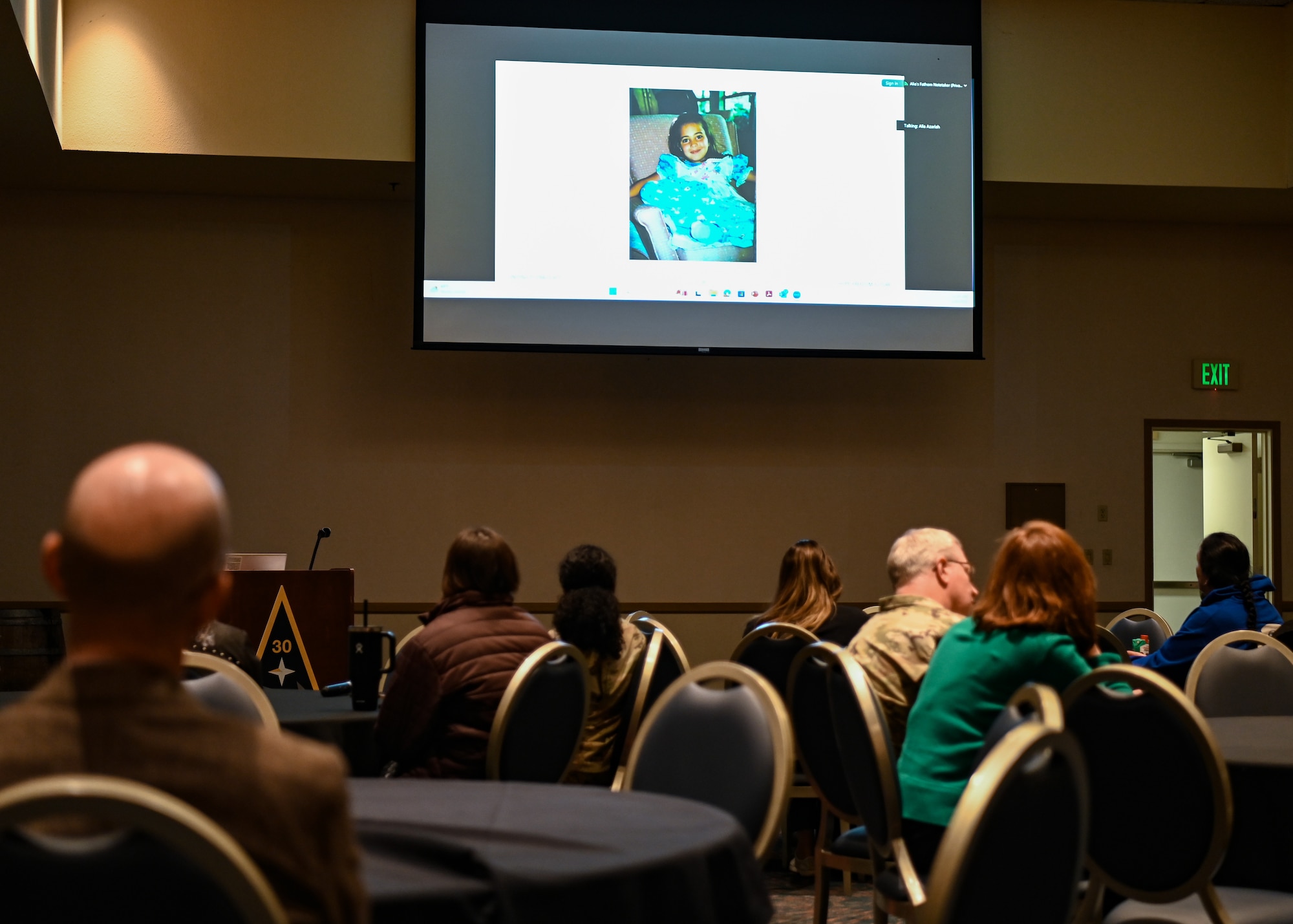 A Safe House Project aftercare director, shares her personal story as a human trafficking survivor via Zoom, raising awareness among base members during a luncheon at Vandenberg Space Force Base.