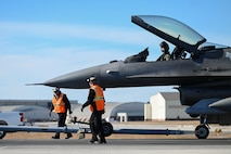 U.S. Air Force Maj. David Leedom, 157th Fighter Squadron pilot, McEntire Joint National Guard Base, South Carolina, is towed to re-fuel after completing an arresting cable certification at Joint Base Charleston, S.C., Jan. 28, 2025. Joint Base Charleston works in conjunction with different bases to maximize mission performance through safety training procedures and annual certifications.