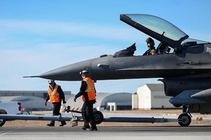 U.S. Air Force Maj. David Leedom, 157th Fighter Squadron pilot, McEntire Joint National Guard Base, South Carolina, is towed to re-fuel after completing an arresting cable certification at Joint Base Charleston, S.C., Jan. 28, 2025. Joint Base Charleston works in conjunction with different bases to maximize mission performance through safety training procedures and annual certifications.