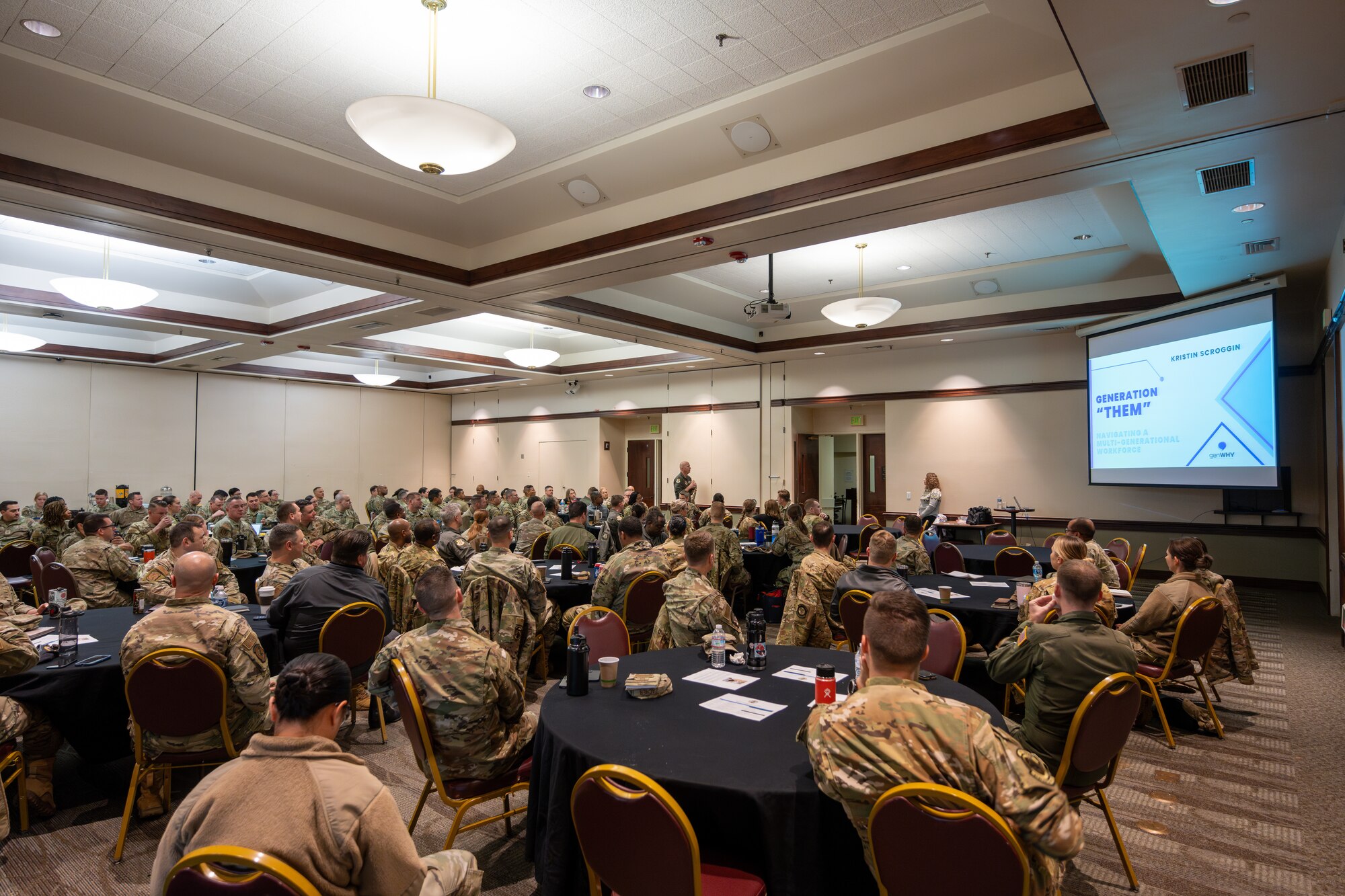 Airmen attend meeting in auditorium