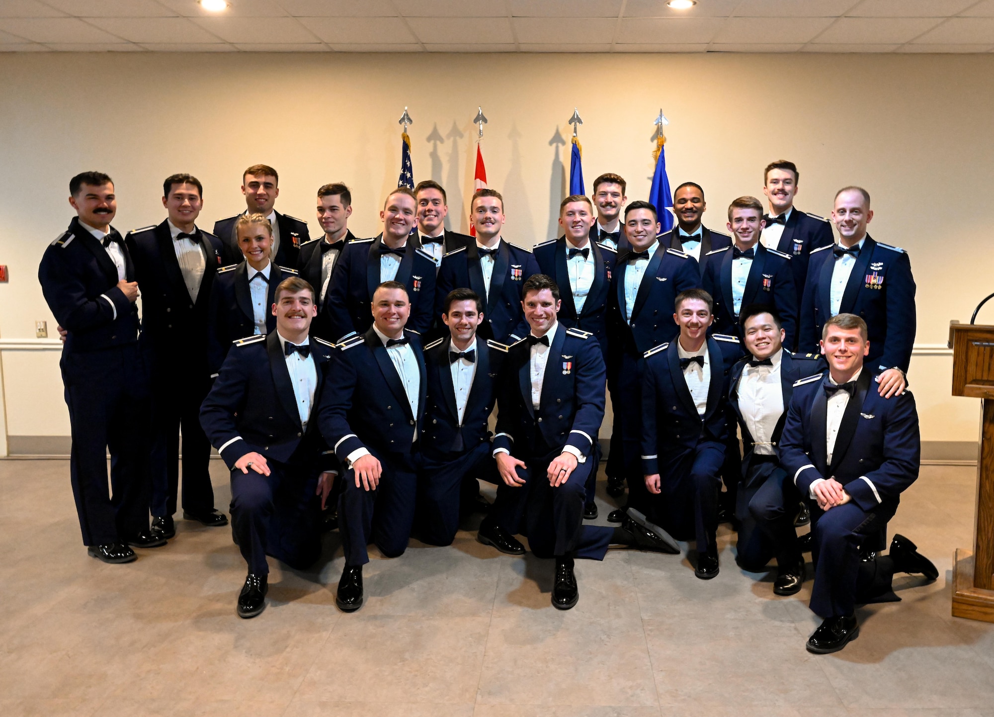 U.S. Air Force Airmen from graduating Class 25-05 pose for a group photo at Laughlin Air Force Base, Texas, Jan. 30, 2025. Twenty-two U.S. Air Force officers were awarded silver wings during the ceremony, symbolizing their completion of the Undergraduate Pilot Training program. (U.S. Air Force photo by Airman 1st Class Harrison Sullivan)