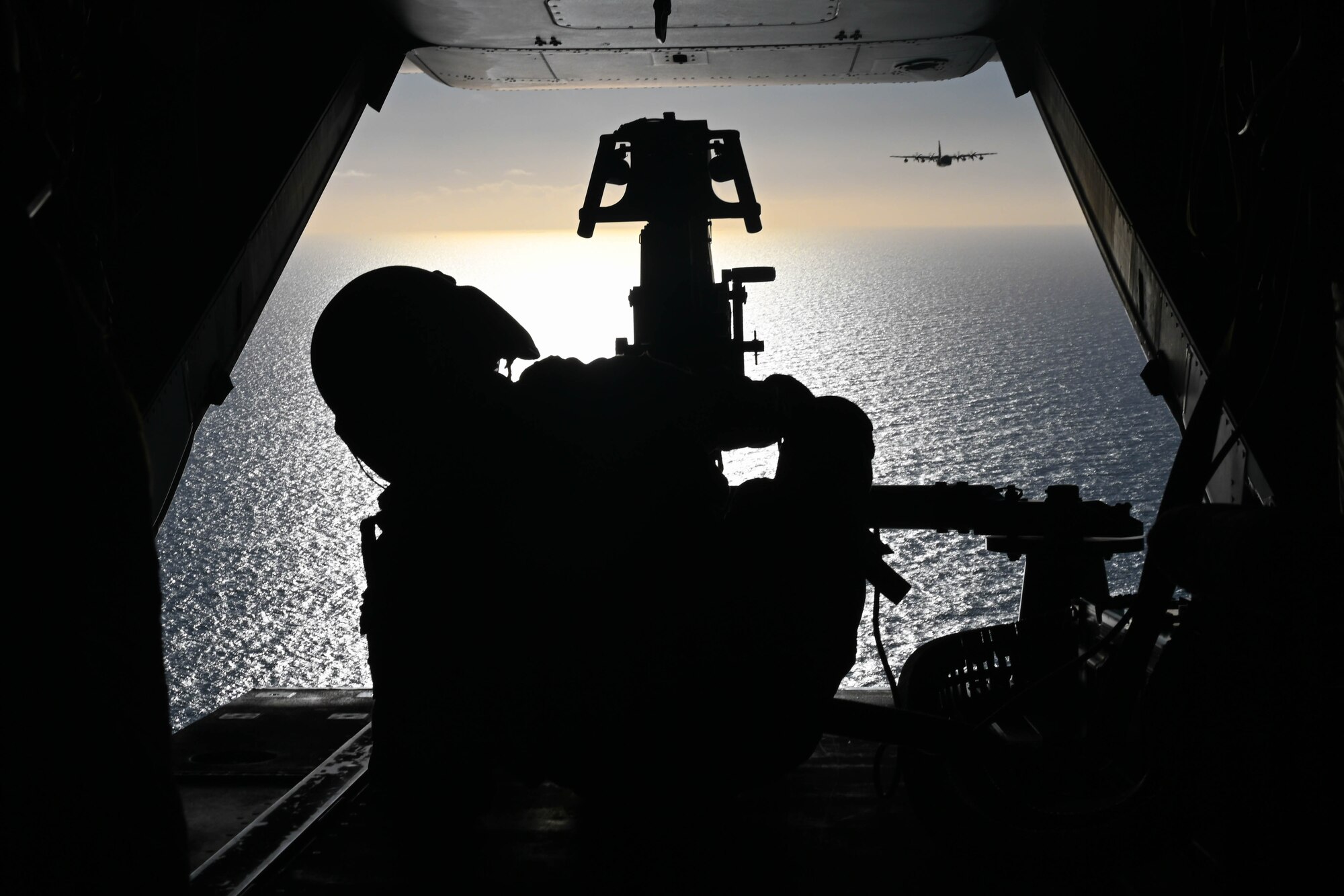 Aircrew sits at the back on a CV-22