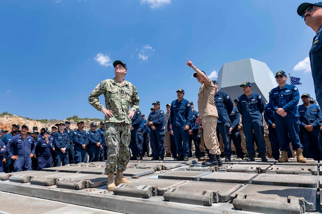 Sailors assigned to the Arleigh Burke-class guided-missile destroyer USS Thomas Hudner (DDG 116) welcome Adm. Stuart Munsch, Commander, U.S. Naval Forces Europe/Africa, Allied Joint Forces Command, Naples, for a tour of the ship at the NATO Marathi Pier Complex during his scheduled visit to Naval Support Activity (NSA) Souda Bay, June 29, 2025.