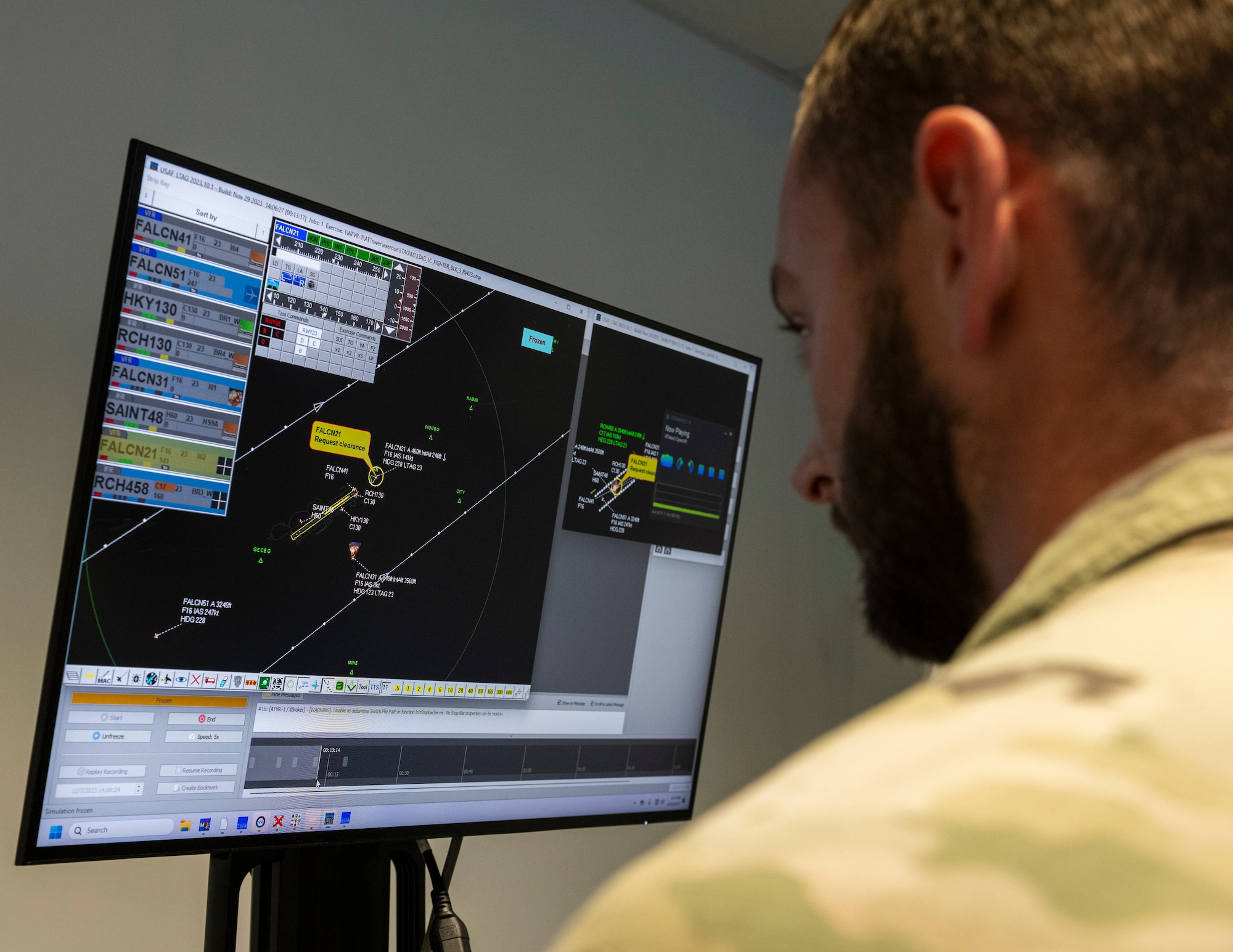 U.S. Air Force Senior Airman Jacob Rigby, 39th Operations Support Squadron air traffic control trainer, runs a custom scenario inside the virtual reality simulator at Incirlik Air Base, Türkiye, June 30, 2025.