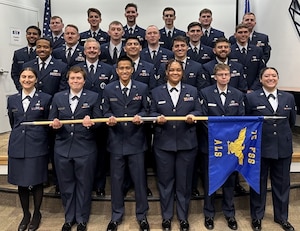 Airmen enrolled in Airman Leadership School Class 25-Echo here were honored during a graduation ceremony June 26 at The Landing.
