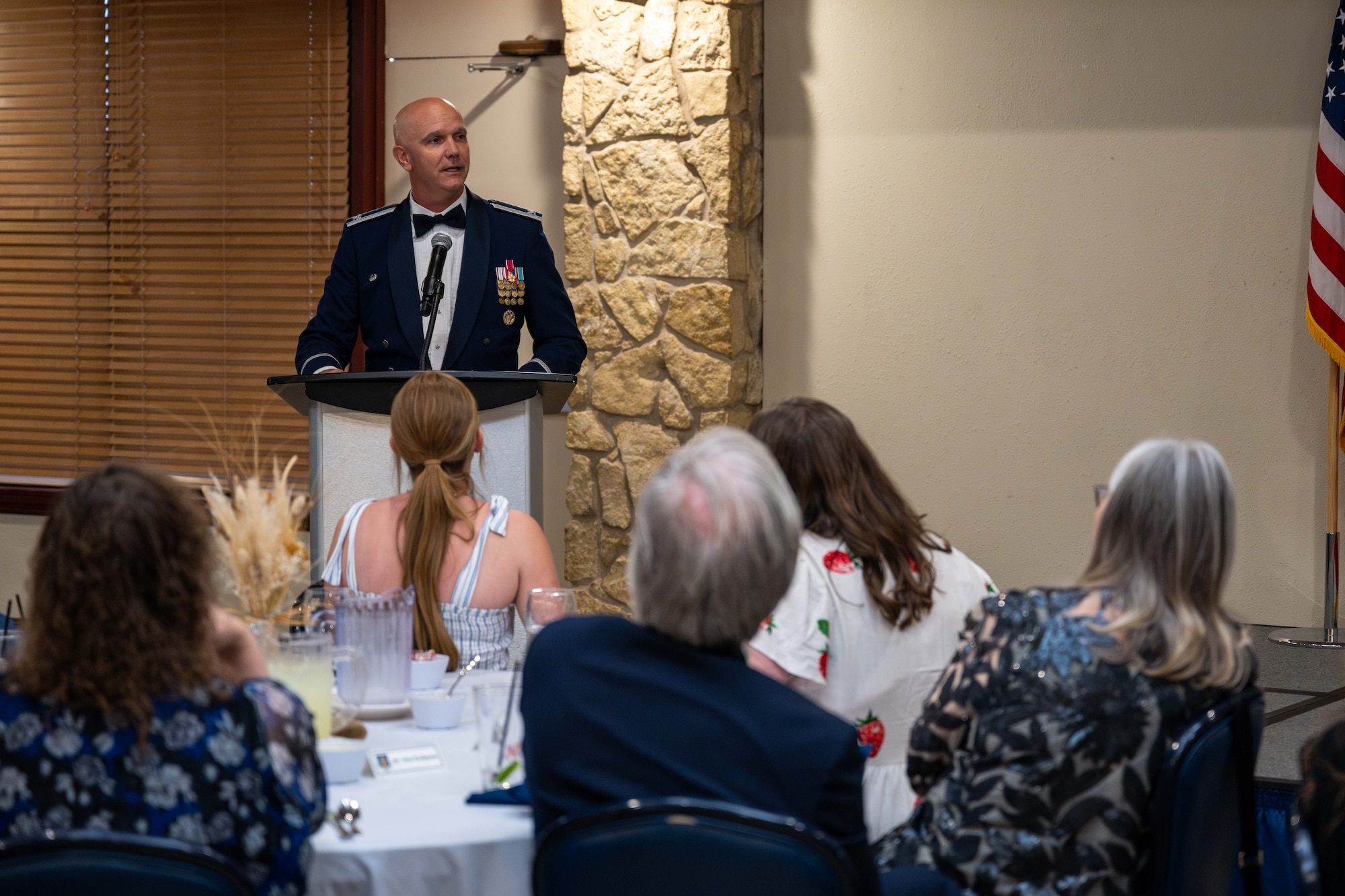 U.S. Air Force Col. Jeff Marshall, 97th Air Mobility Wing commander, delivers a speech during the Friends of Altus Induction Ceremony, June 26, 2025, at Altus Air Force Base, Oklahoma. Marshall inducted the 29th Friend of Altus during the ceremony. (U.S. Air Force Photo by Airman 1st Class Jonah Bliss)