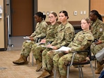 Cadets watch attentively as the Nurse Summer Training Program completion ceremony gets underway. The event marks the culmination of their 28-day clinical immersion experience.